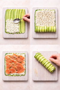 Zucchini rolls filled with smoked salmon and cream cheese, sliced into bite sized pinwheels and served on a white plate with dill and sesame seeds.